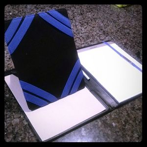 Students notebook with iPad and tablet grip pad